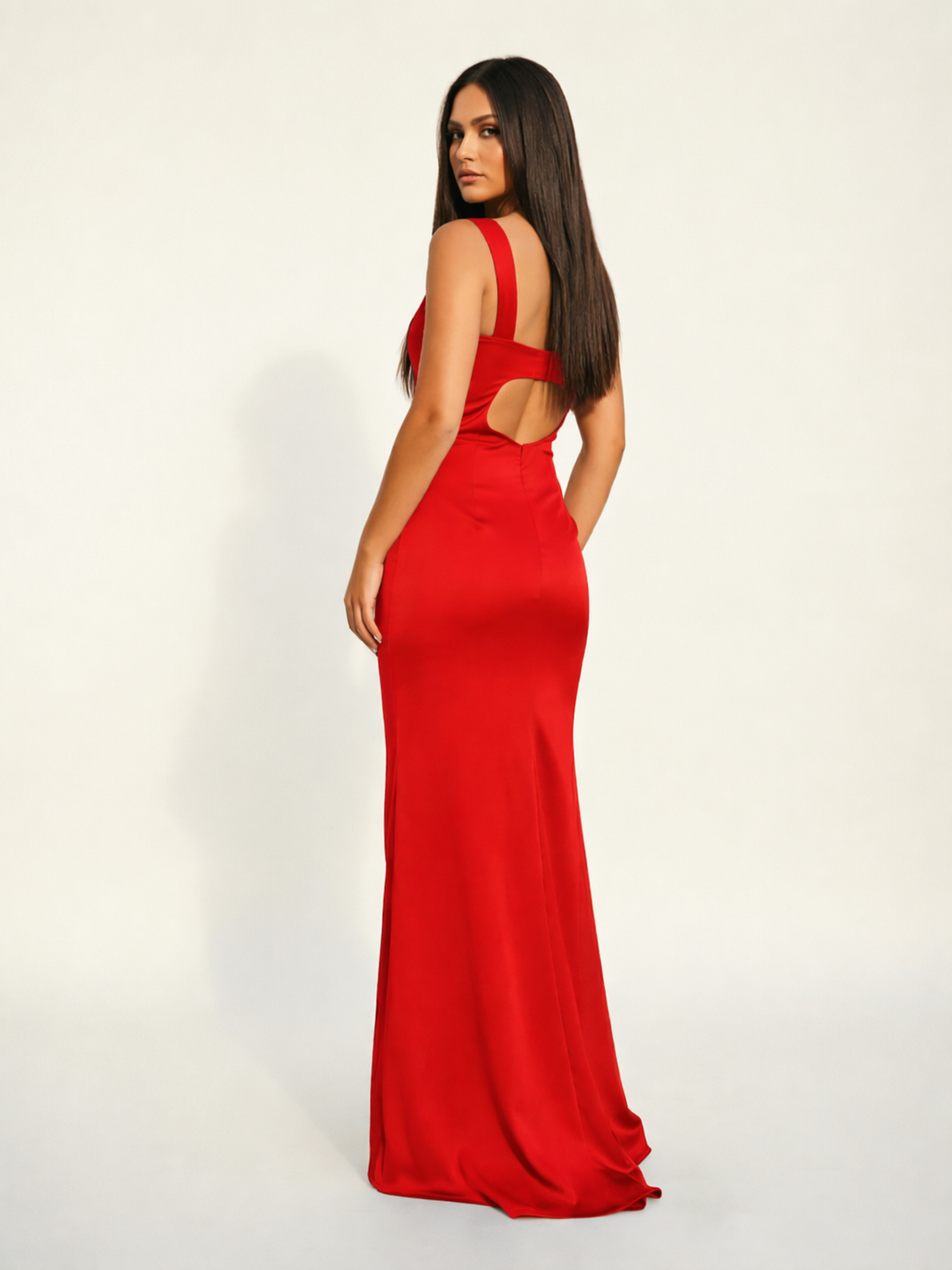 Satin cup-shaped halter dress with back opening revealing the back