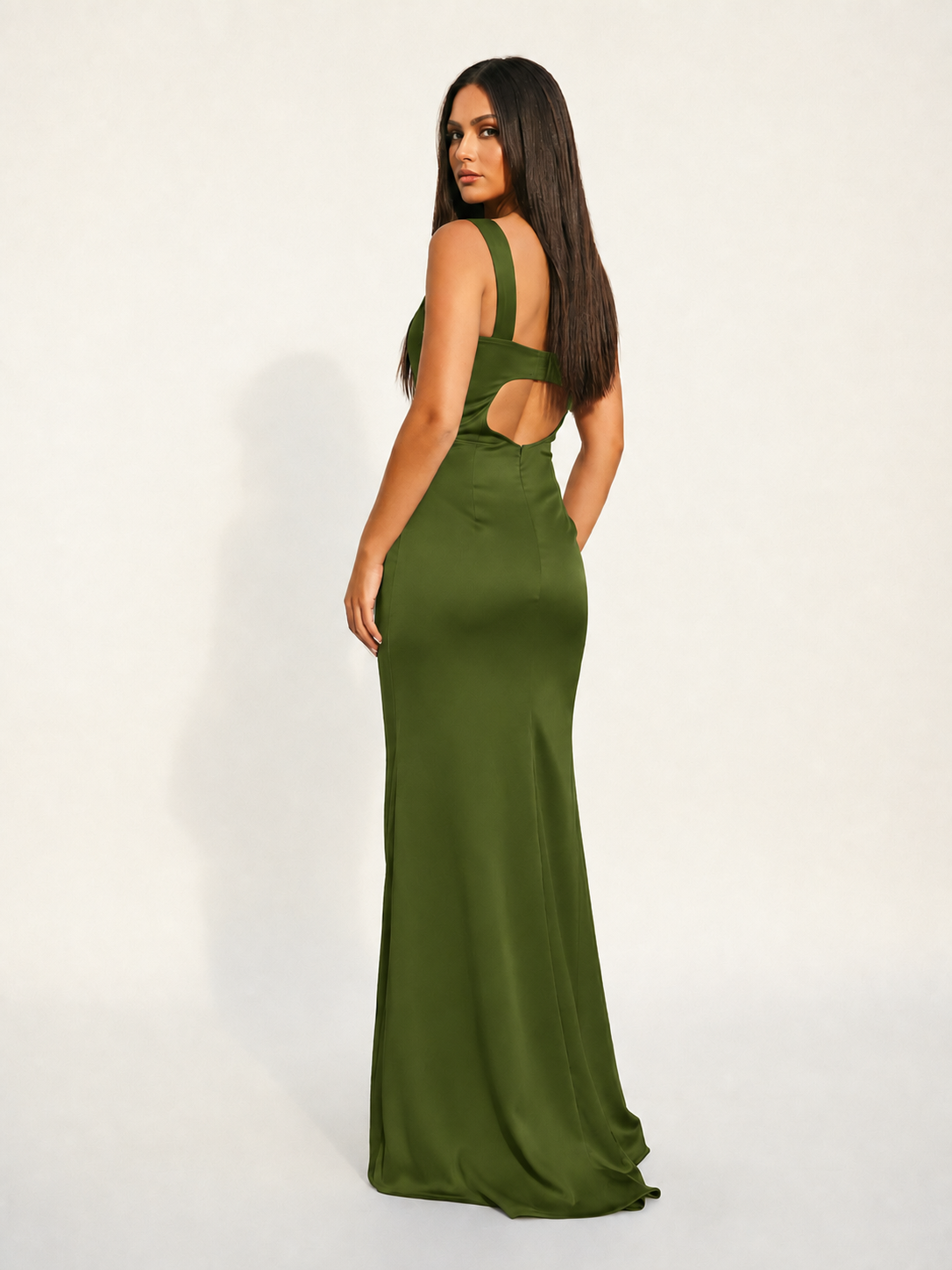 Satin cup-shaped halter dress with back opening revealing the back