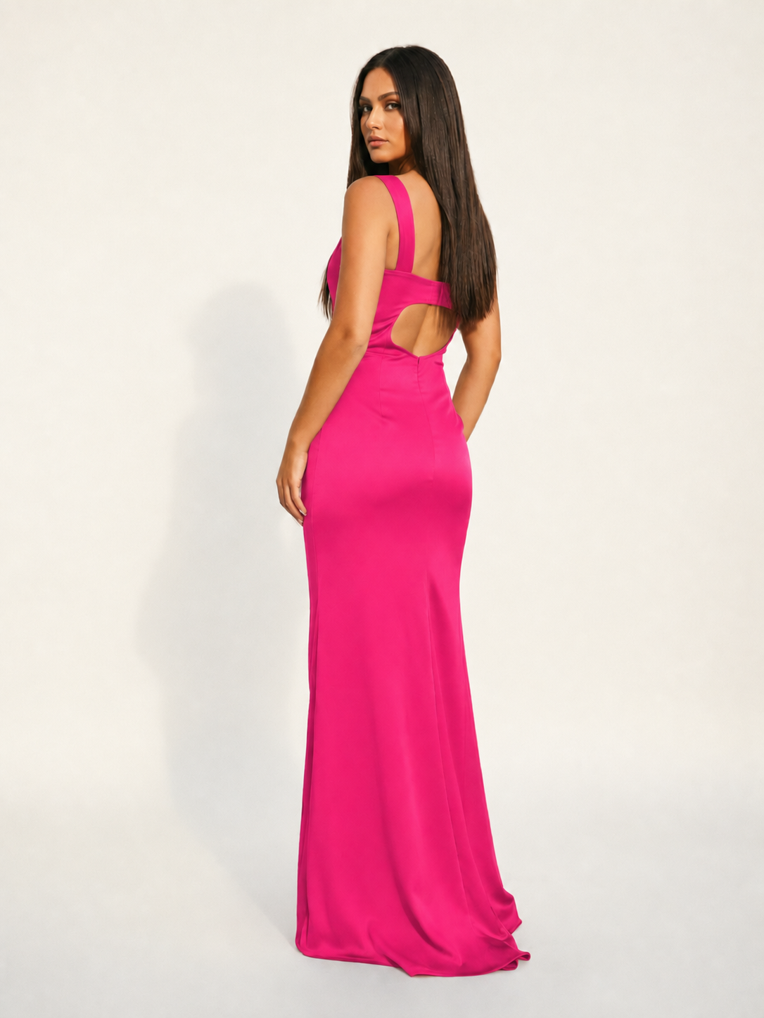 Satin cup-shaped halter dress with back opening revealing the back