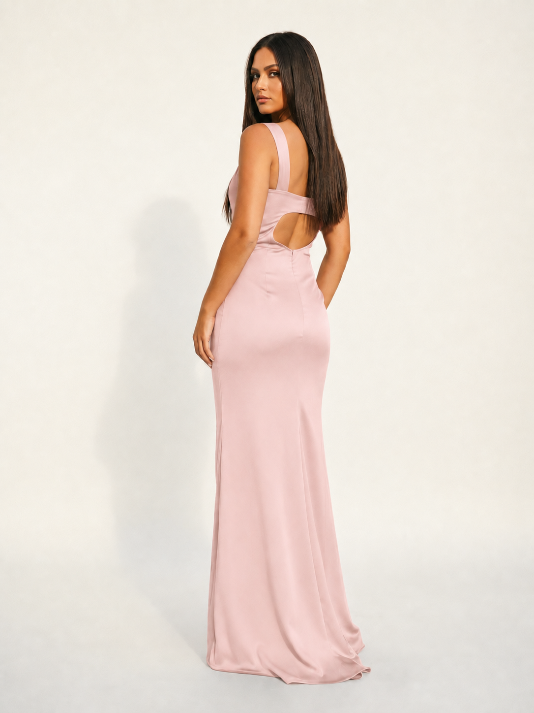 Satin cup-shaped halter dress with back opening revealing the back