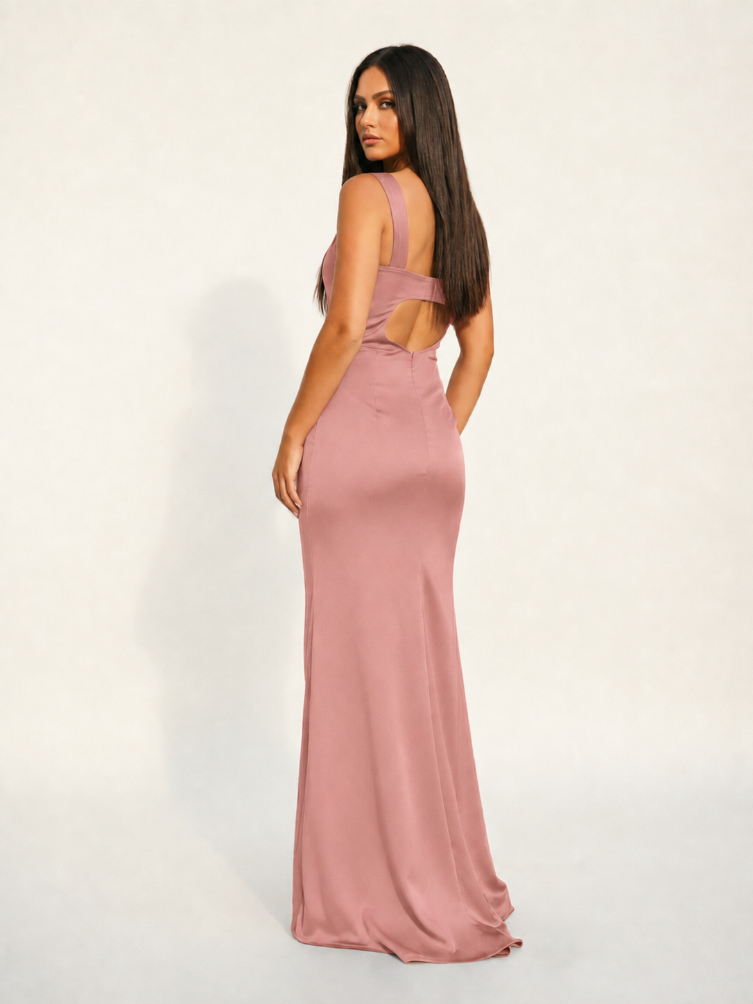 Satin cup-shaped halter dress with back opening revealing the back