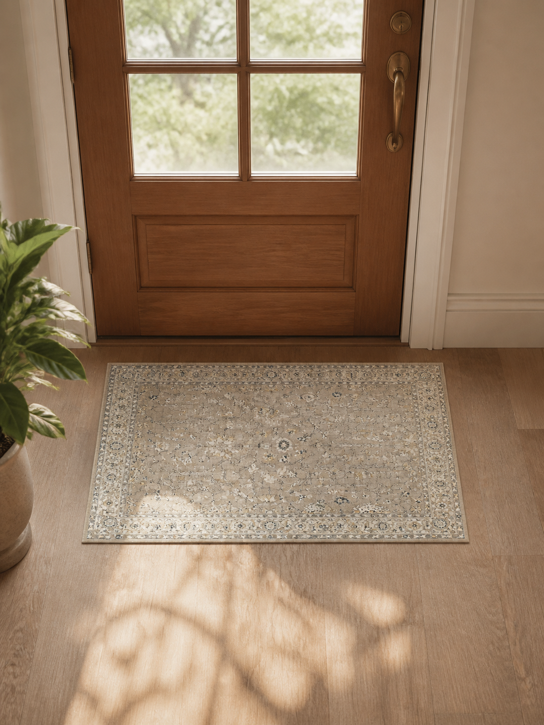 Muted Antique‑Style Floral Area Rug